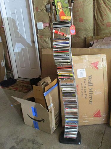 Multi family tons of books, Halloween costumes, Golf photo