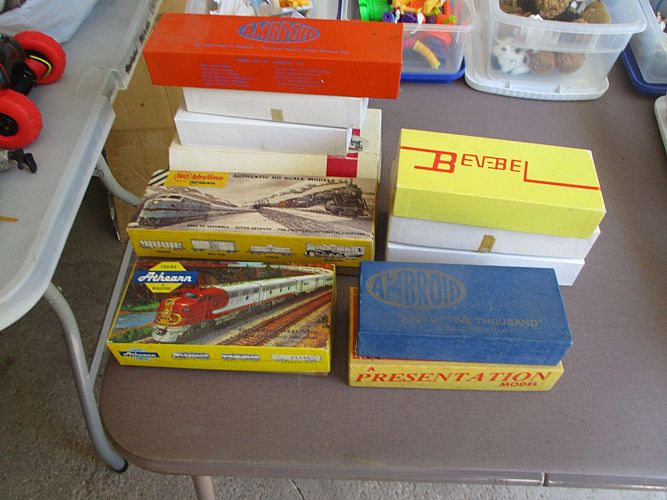 Multi family tons of books, Halloween costumes, Golf photo