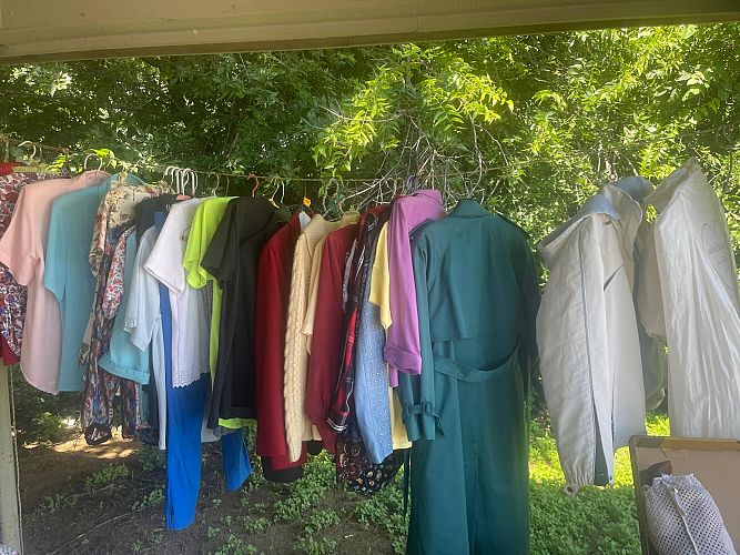 Yard sale with a lot of stuff photo